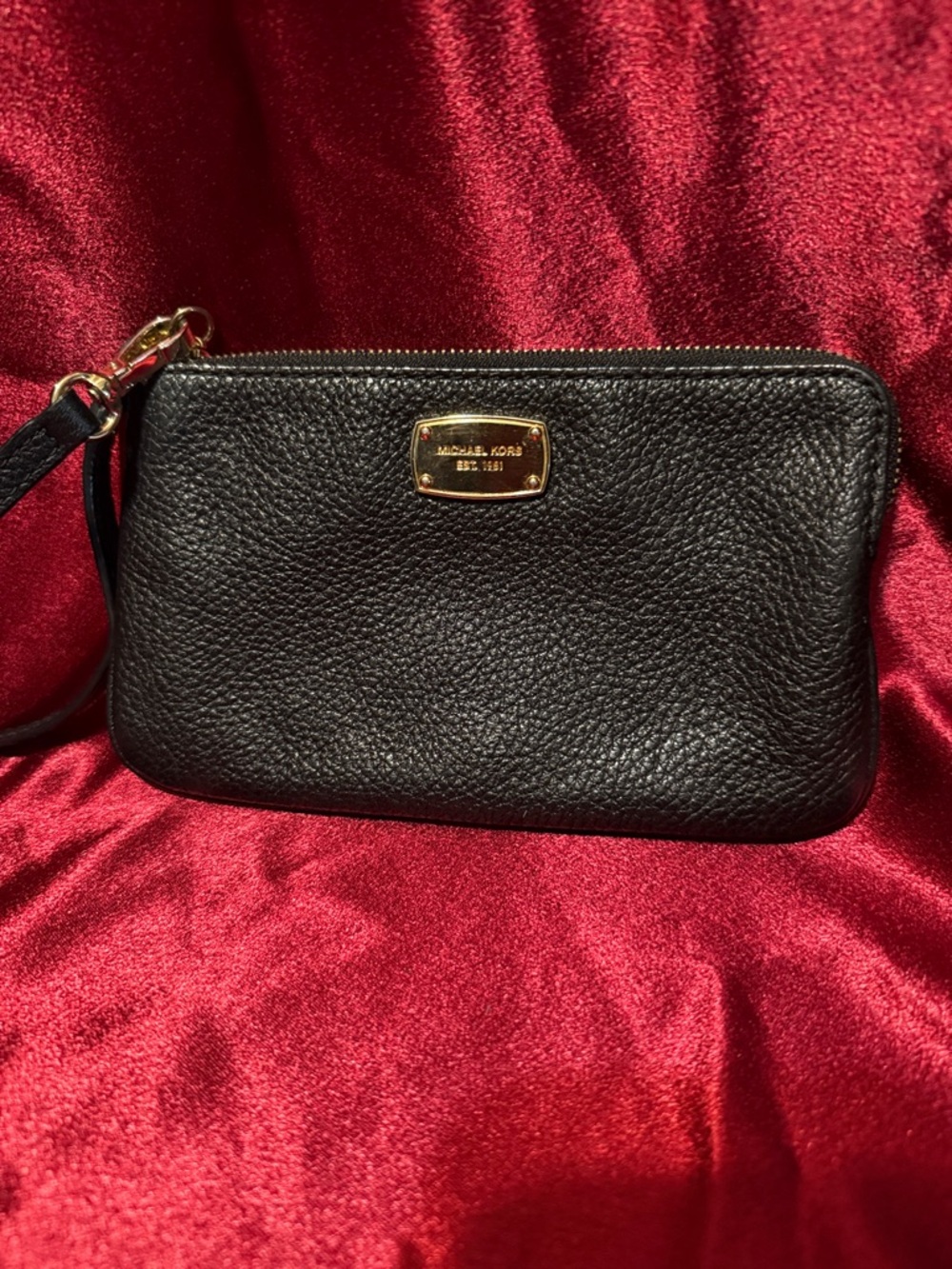 Michael Kors Black Pebbled Leather Wristlet with Gold Plaque